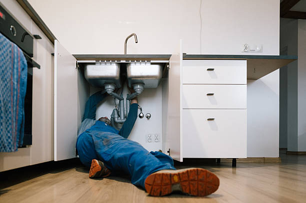 Professional Emergency Plumber technician working in Starford, PA